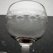 9 guilloché wine glasses, early 20th century.