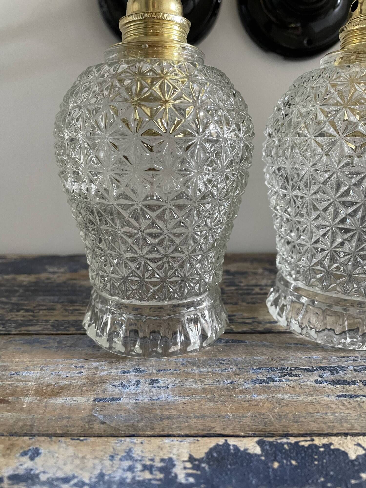 Pair of vintage electrified to nine-piece chiseled glass wall lamps
