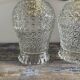 Pair of vintage electrified to nine-piece chiseled glass wall lamps