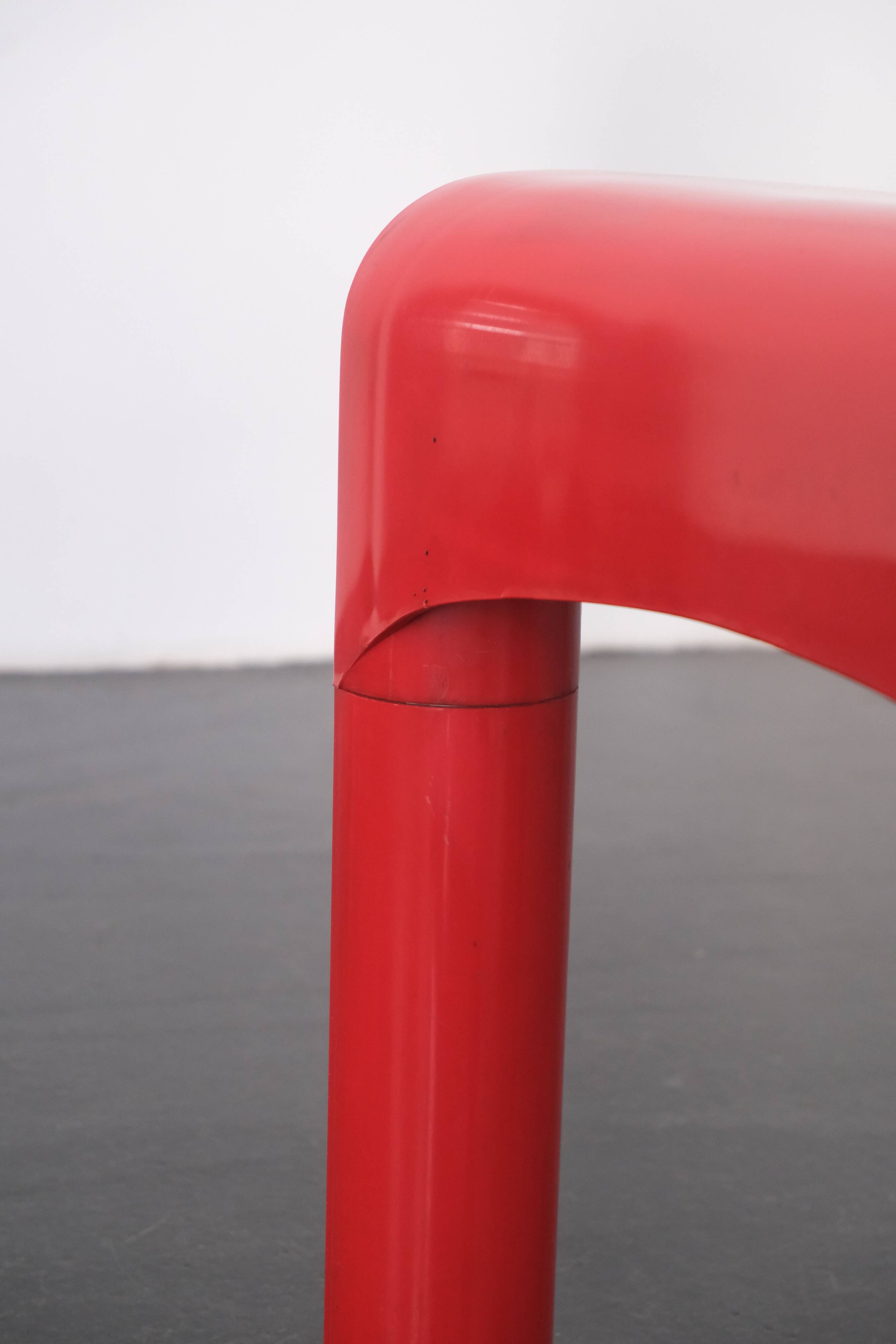 Red "Universale" chair by Joe Colombo / Kartell
