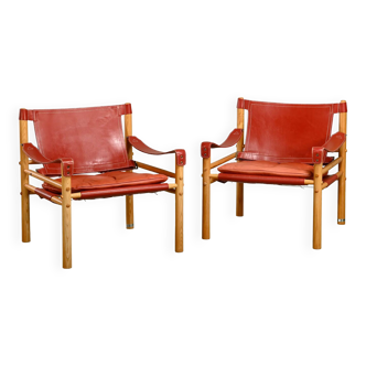 Arne Norell pair Sirocco Safari Lounge Chairs in Red leather and Ash, Sweden