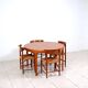 Round dining table in teak by Ib Kofod Larsen for Faarup Mobelfabrik
