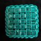 Emerald green braided slip trivet and bottle holder, knife holder