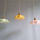 Trio of Art Deco pendant lights in colored opaline glass, 1930s