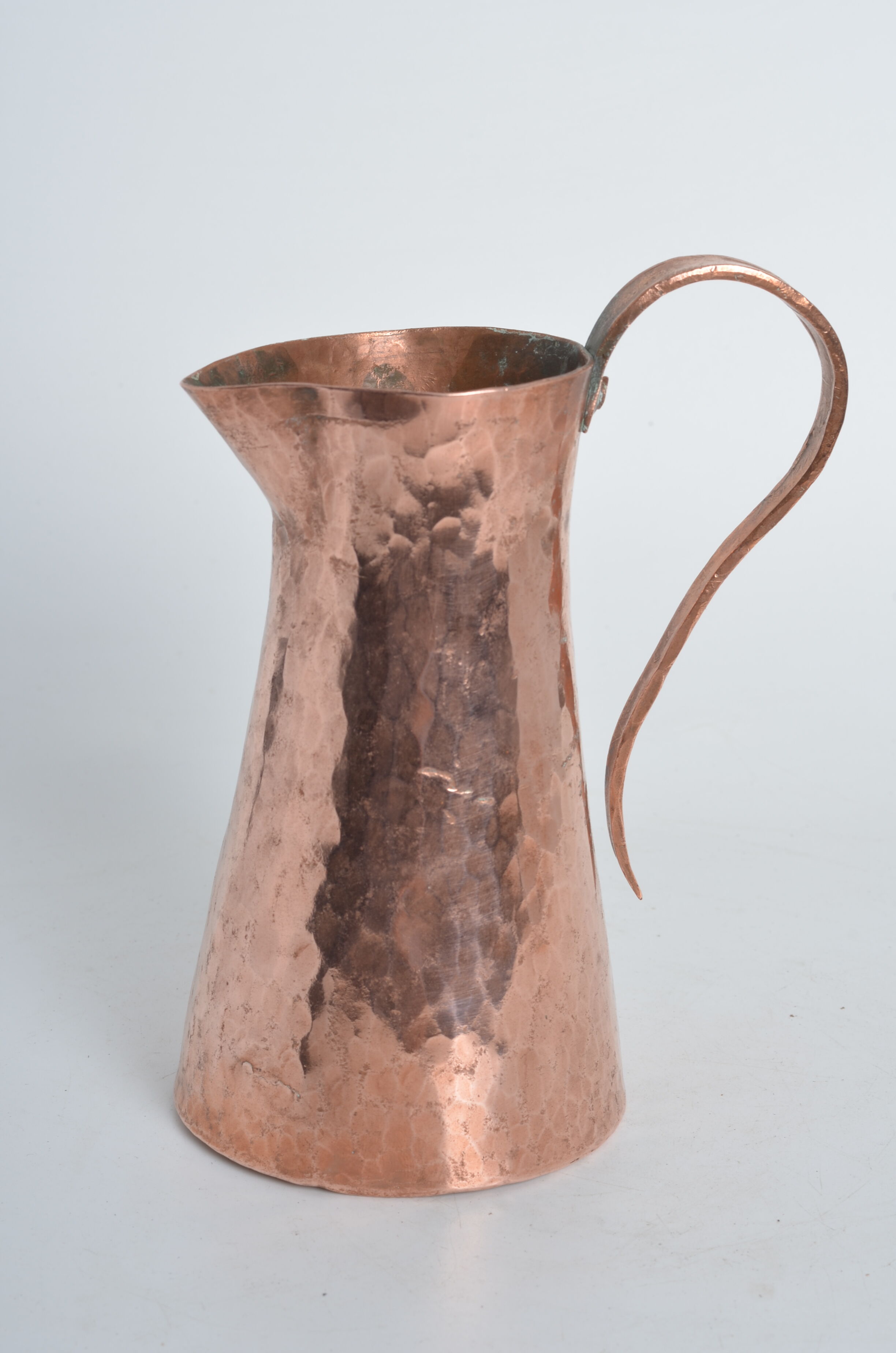 Hammered pink copper pitcher