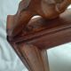 Wooden hanging mirror with vintage carved knot