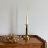 Old brass push candle holder