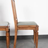 Set of 4 Art Deco chairs in carved wood.