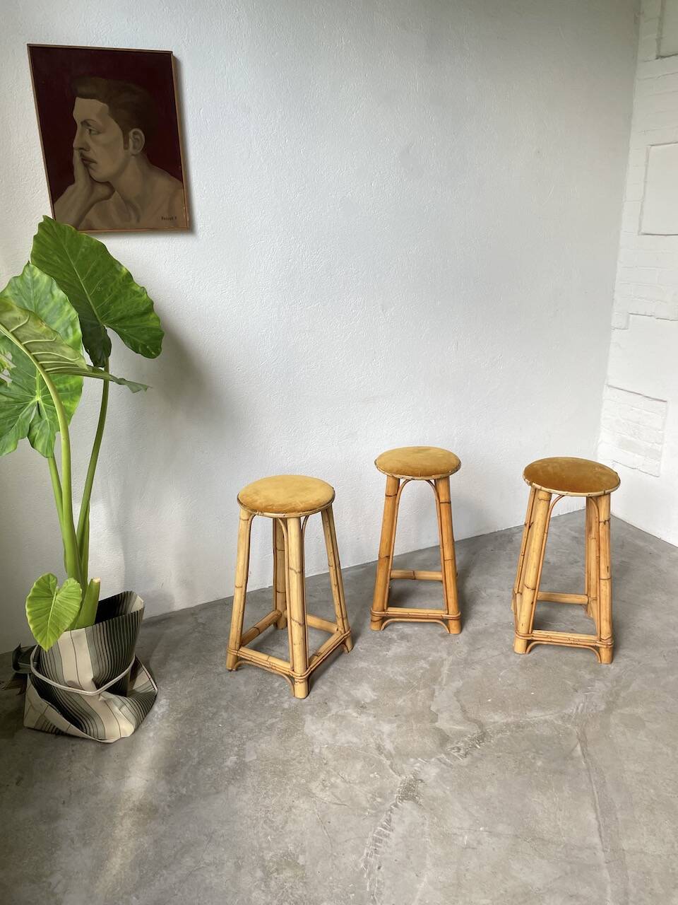 Set of three rattan high stools