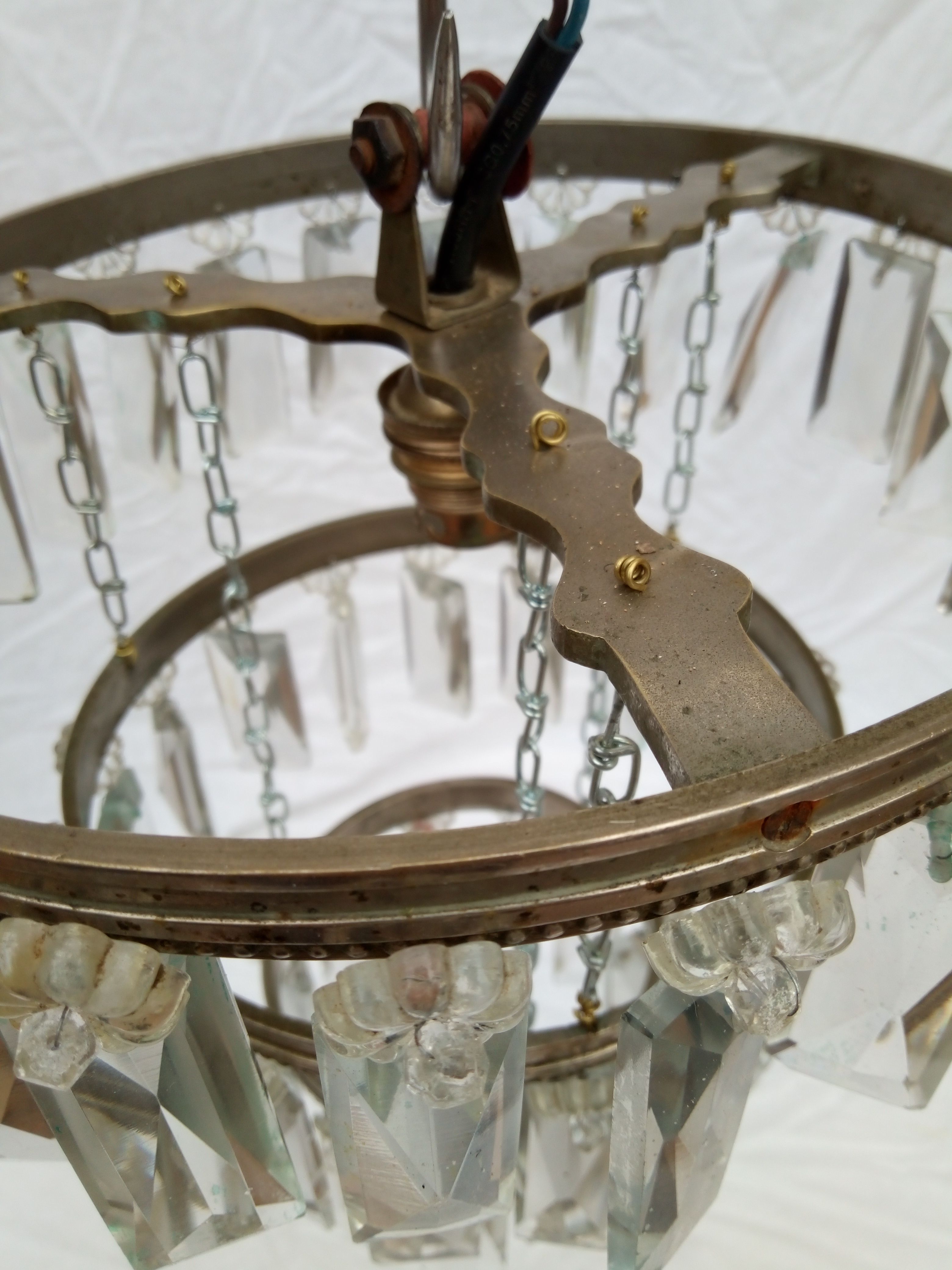 Ancient chandelier, bronze ceiling and stamps, 1900s