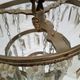 Ancient chandelier, bronze ceiling and stamps, 1900s