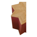 Small star-shaped side table in pink rattan