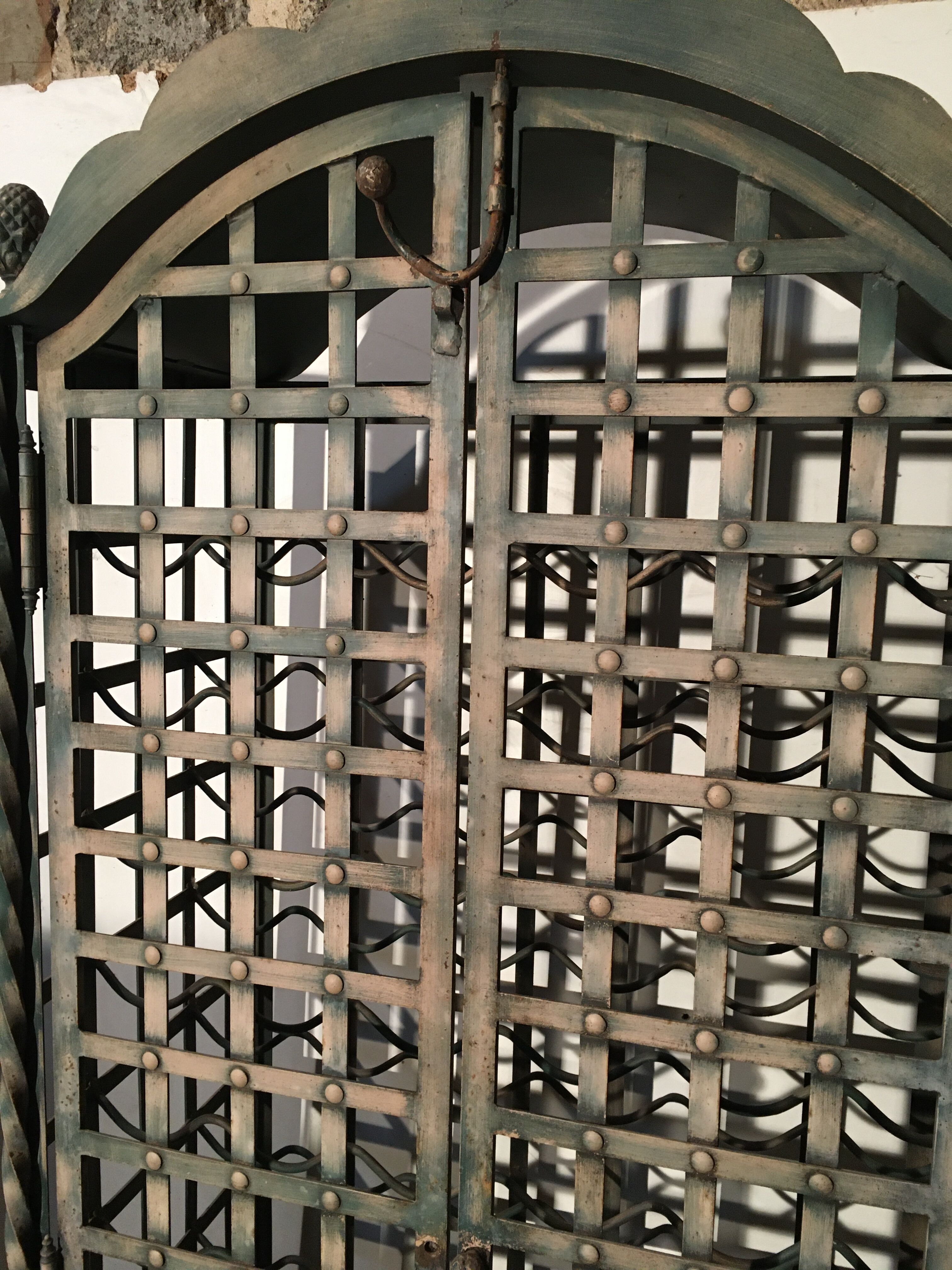 Wrought iron wine cabinet
