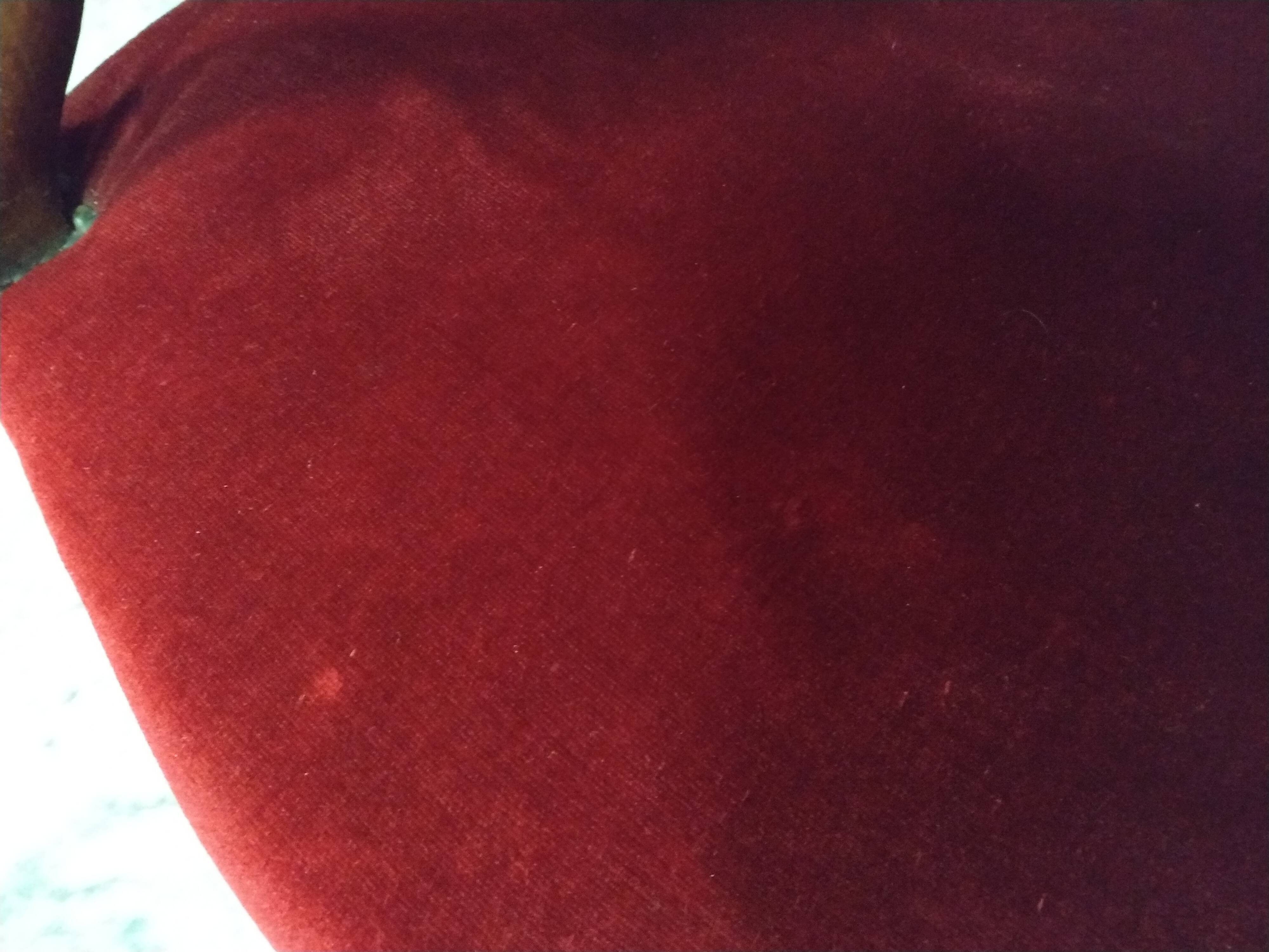 Walnut and velvet armchair