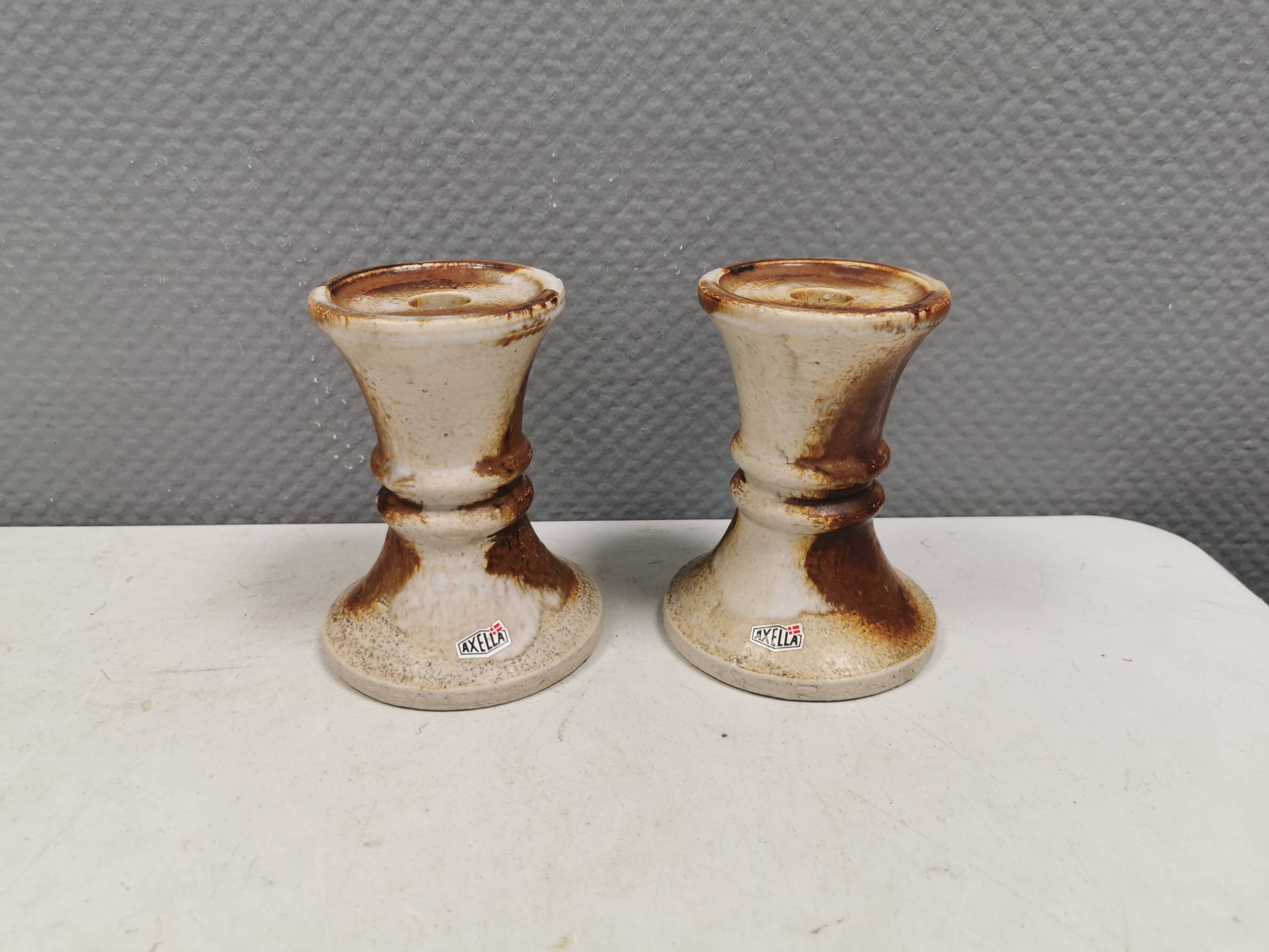 A set of ceramic candleholders by Axel Larsen for his own company, Axella