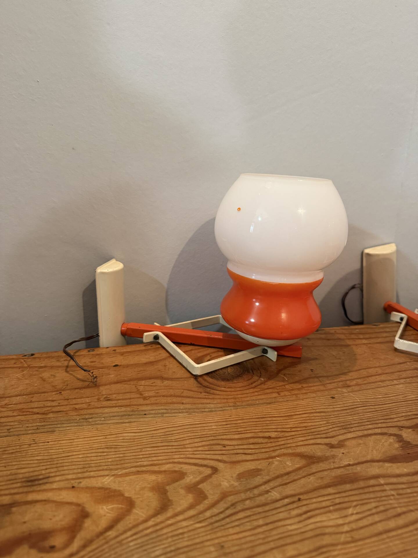 Pair of Space Age design wall lights in metal and vintage opaline.