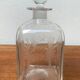 Vintage Danish glass bottle with engraving.