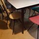 Formica table and coloured chairs