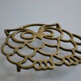 Vintage openwork brass trivet in the shape of an owl or owl