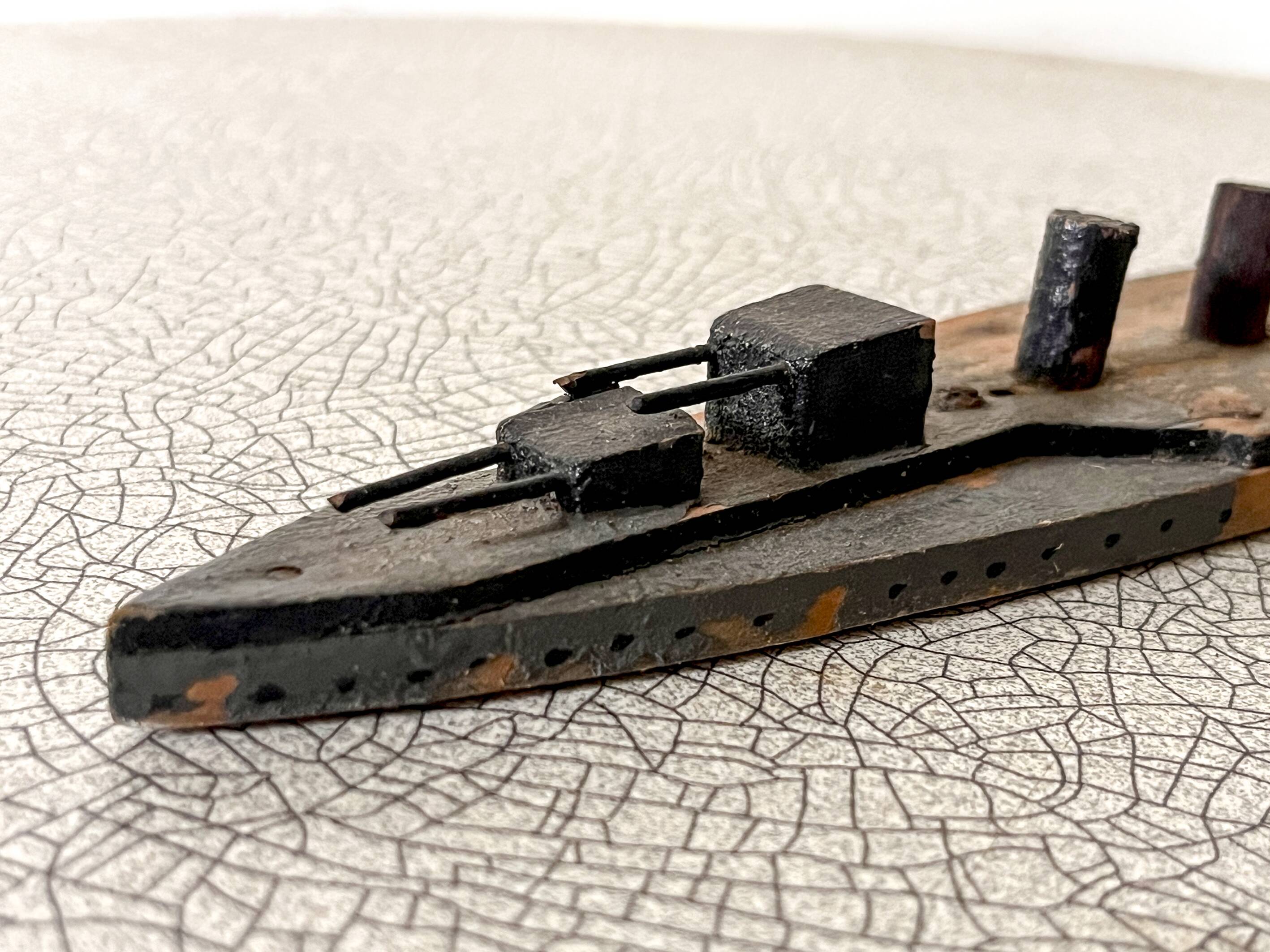 Wooden destroyer boat, antique toy from the early century.