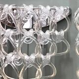 Pair of Art Deco half-moon wall lights in clear glass & metal links