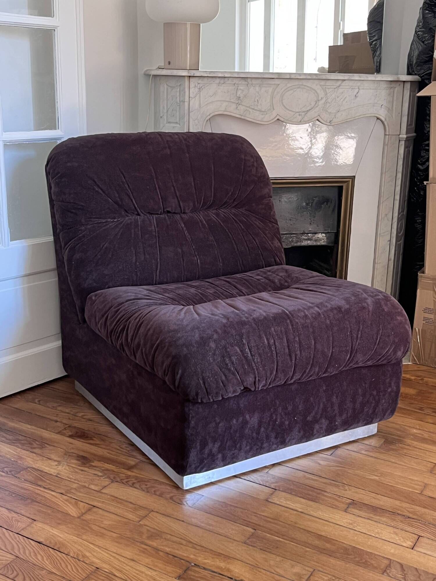 Vintage 1970s lounge chair in chocolate brown velvet with a chrome base.