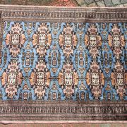 Oriental rug, size 243 x 168 cm, signed and numbered.