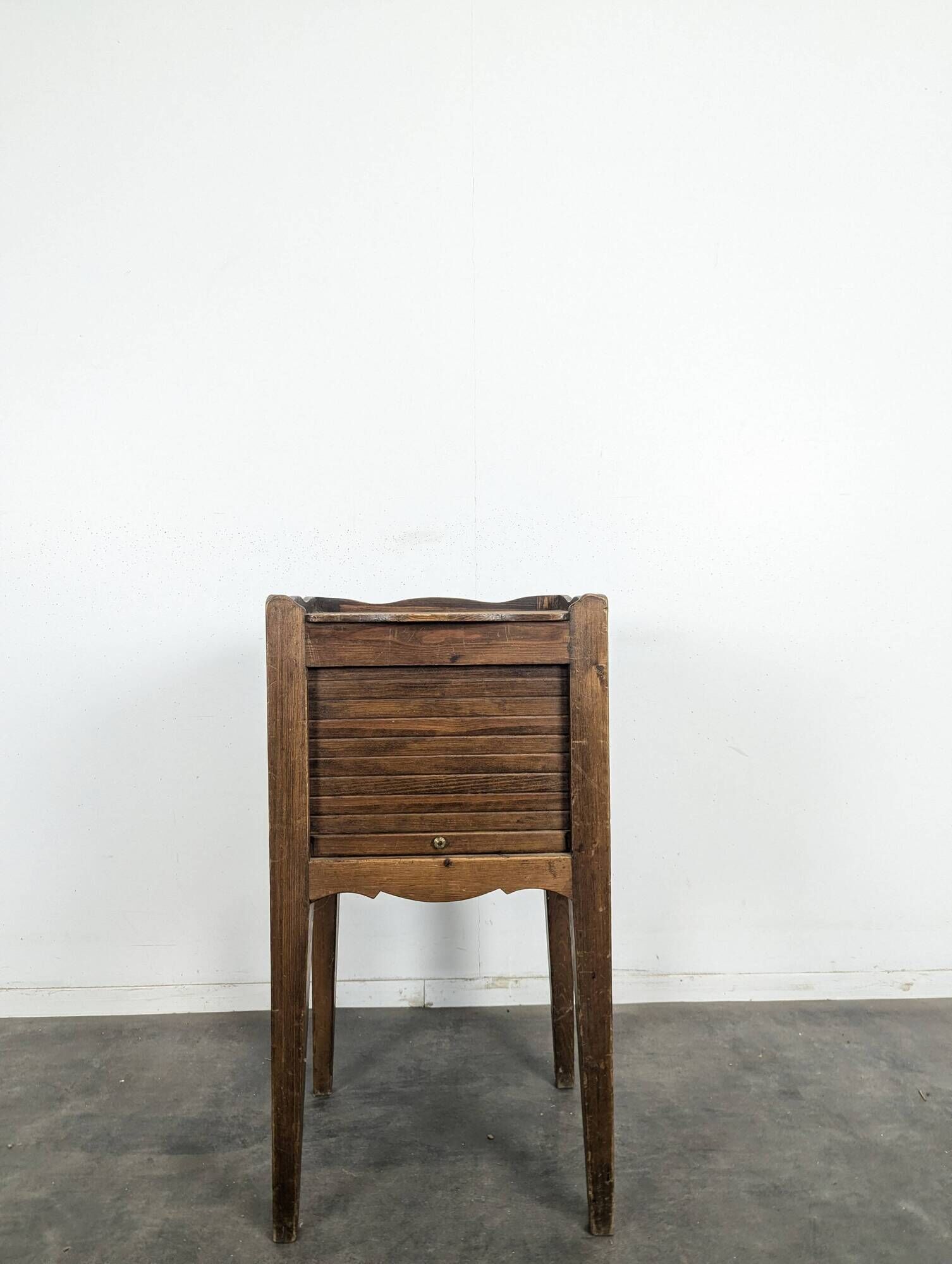 Louis XVI walnut bedside table with pierced hearts curtain