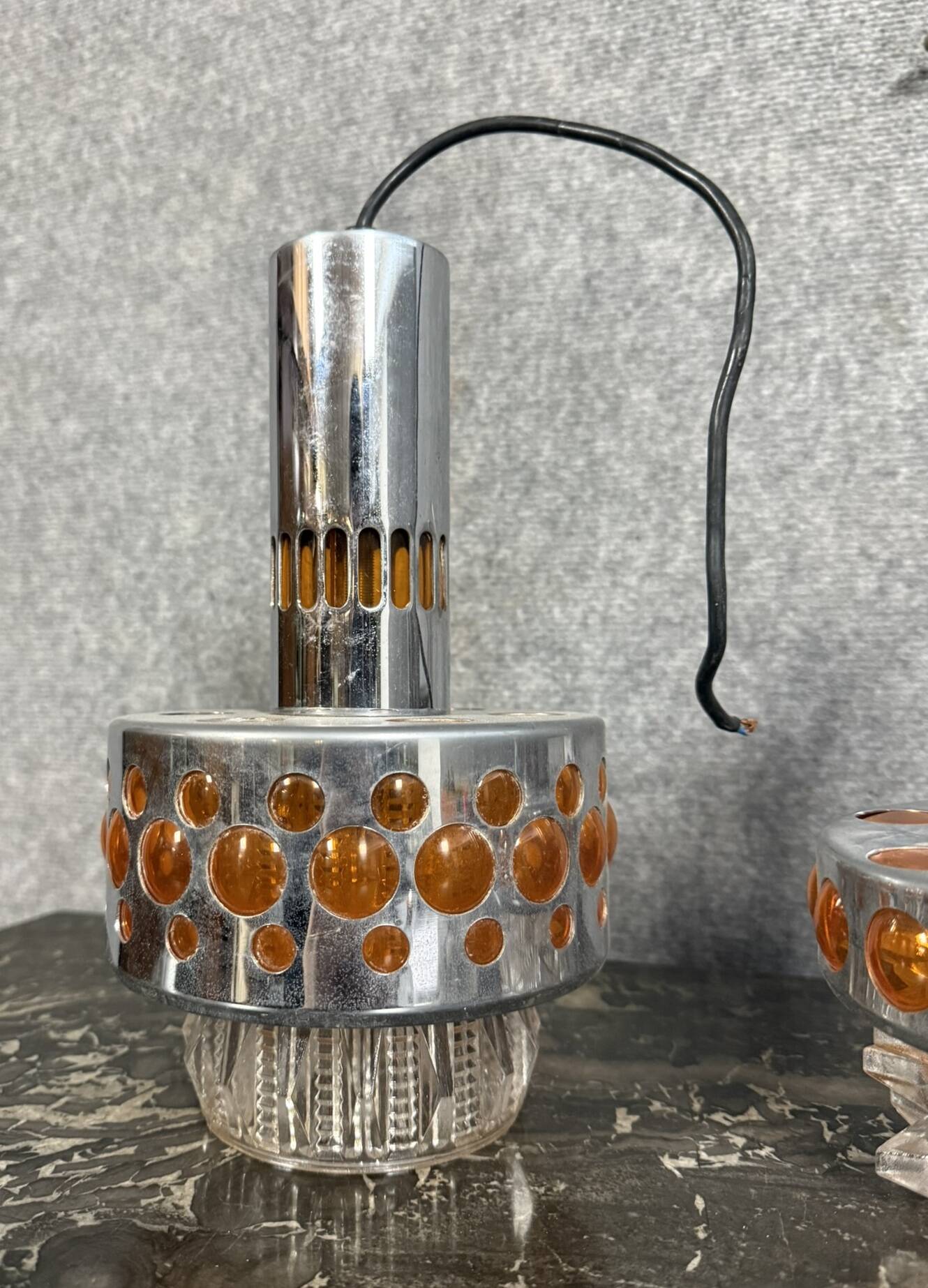 Two vintage space age pendant lamps by Raak, 1970