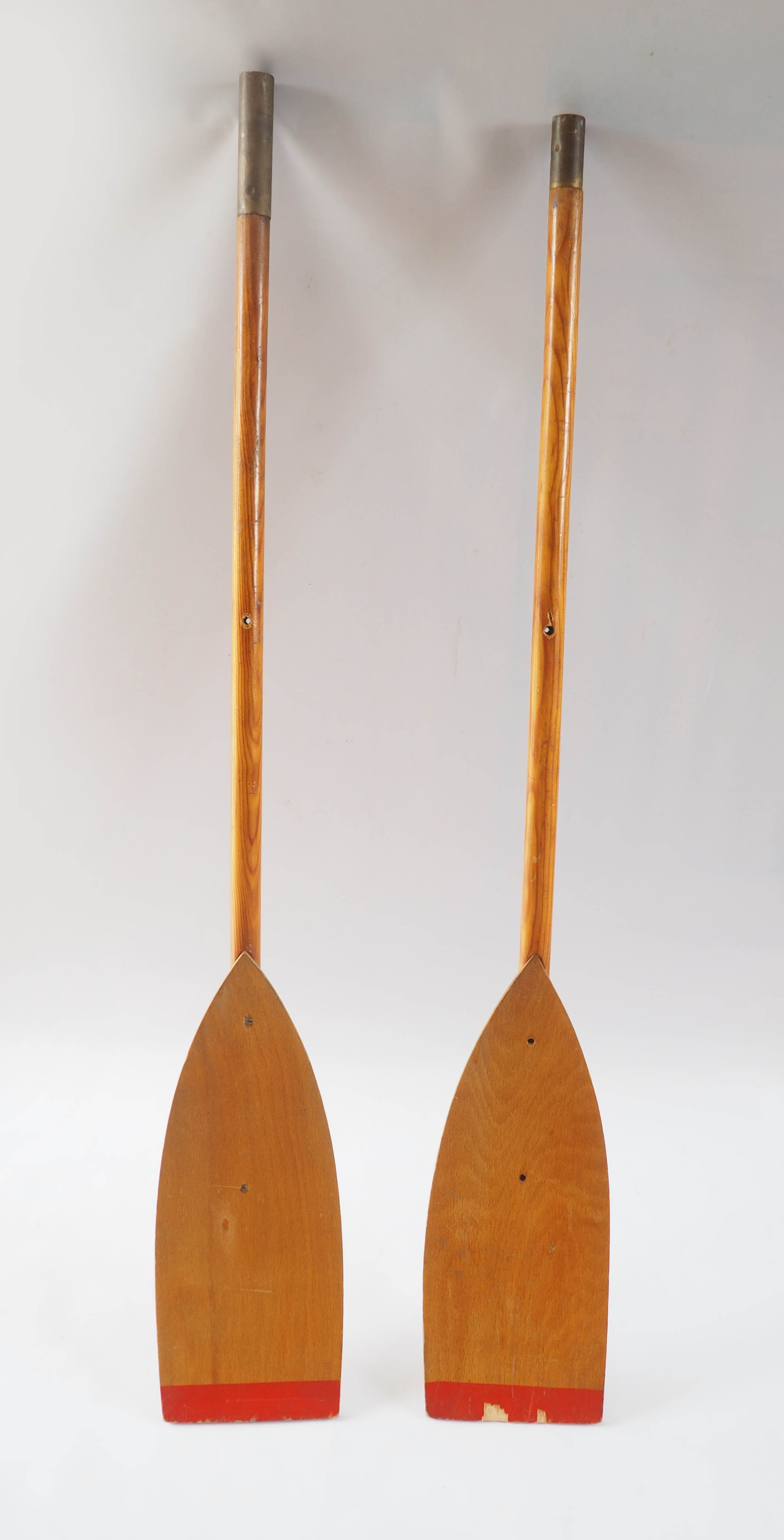 Pair of old wooden oars