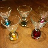 5 small glasses with colored bubble inclusions