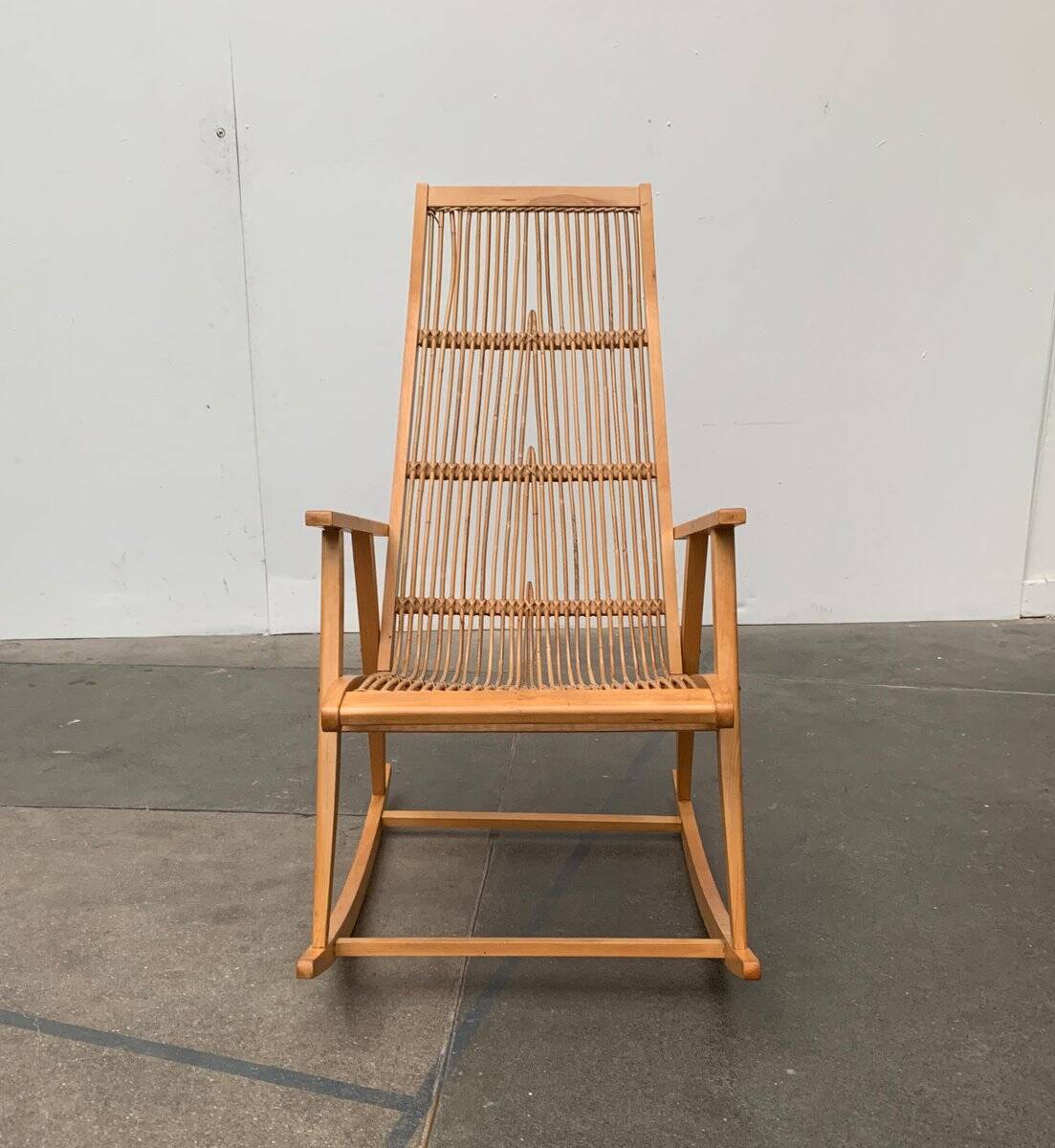 Mid-century German rattan rocking chair from Deutschen Werkstätten Hellerau, 1960s.