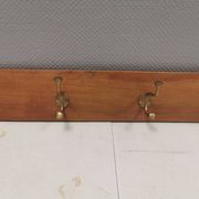 Coat rack in teak and brass. Denmark 1970-80s