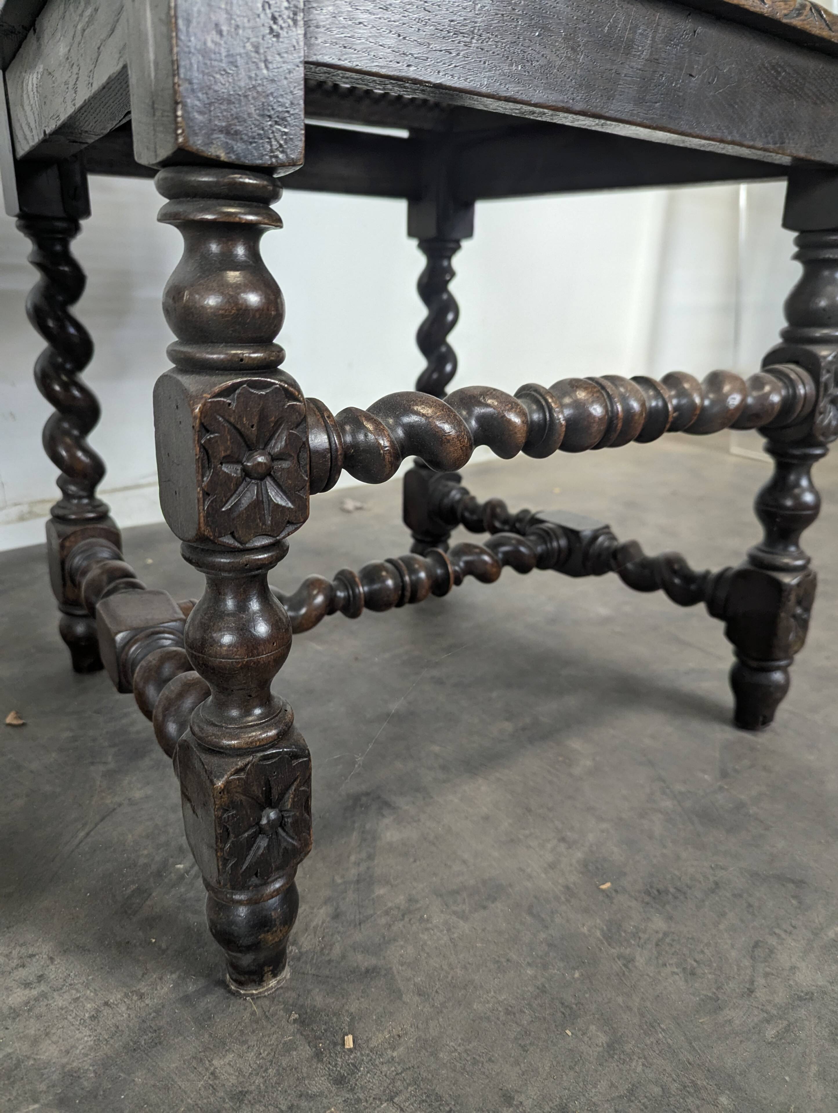 Pair of Louis XIII chairs in twisted oak with caning.