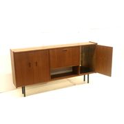 Vintage sideboard cabinet with beautiful handles on metal legs