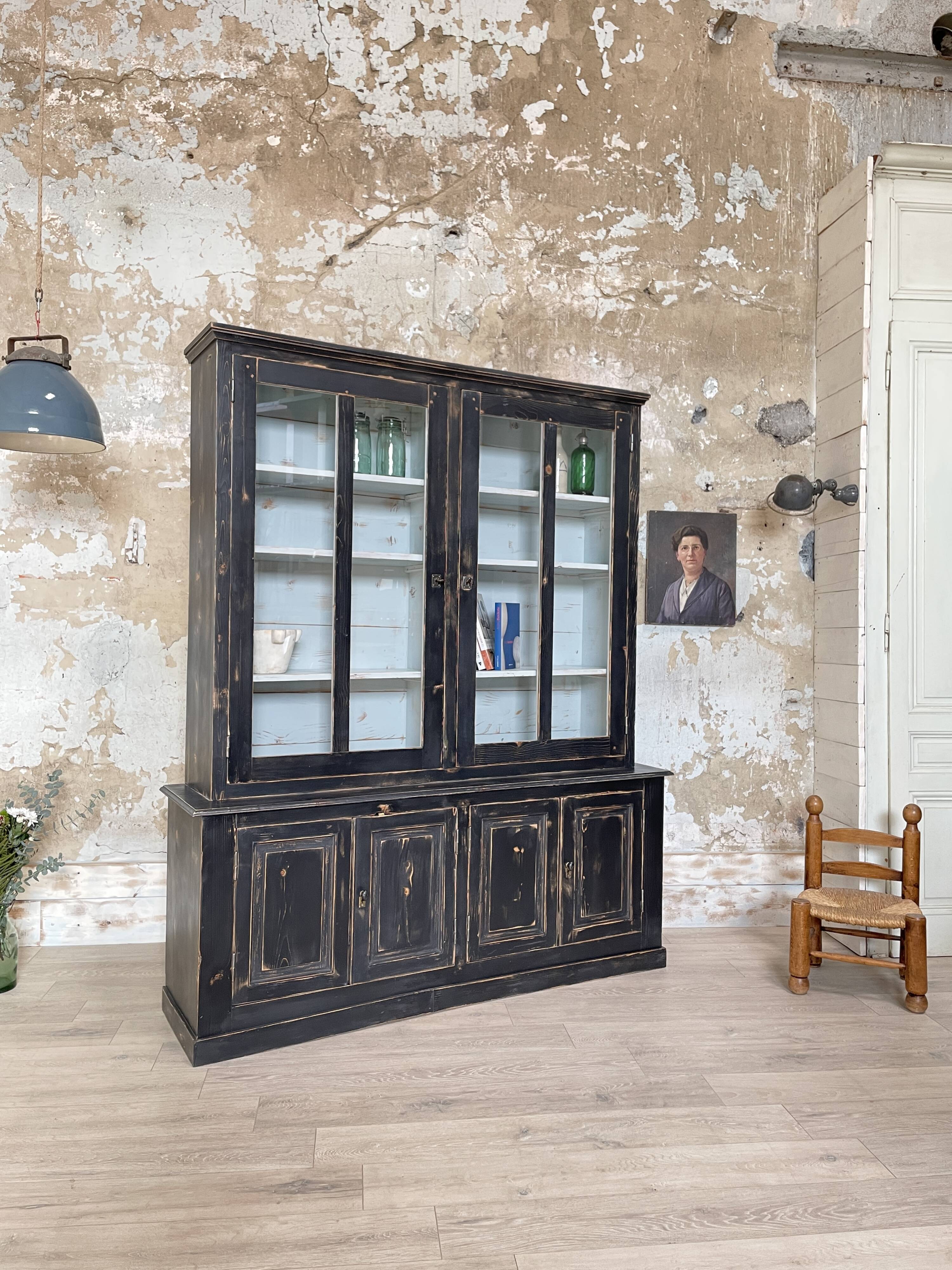 Display cabinet in patinated wood