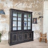 Display cabinet in patinated wood