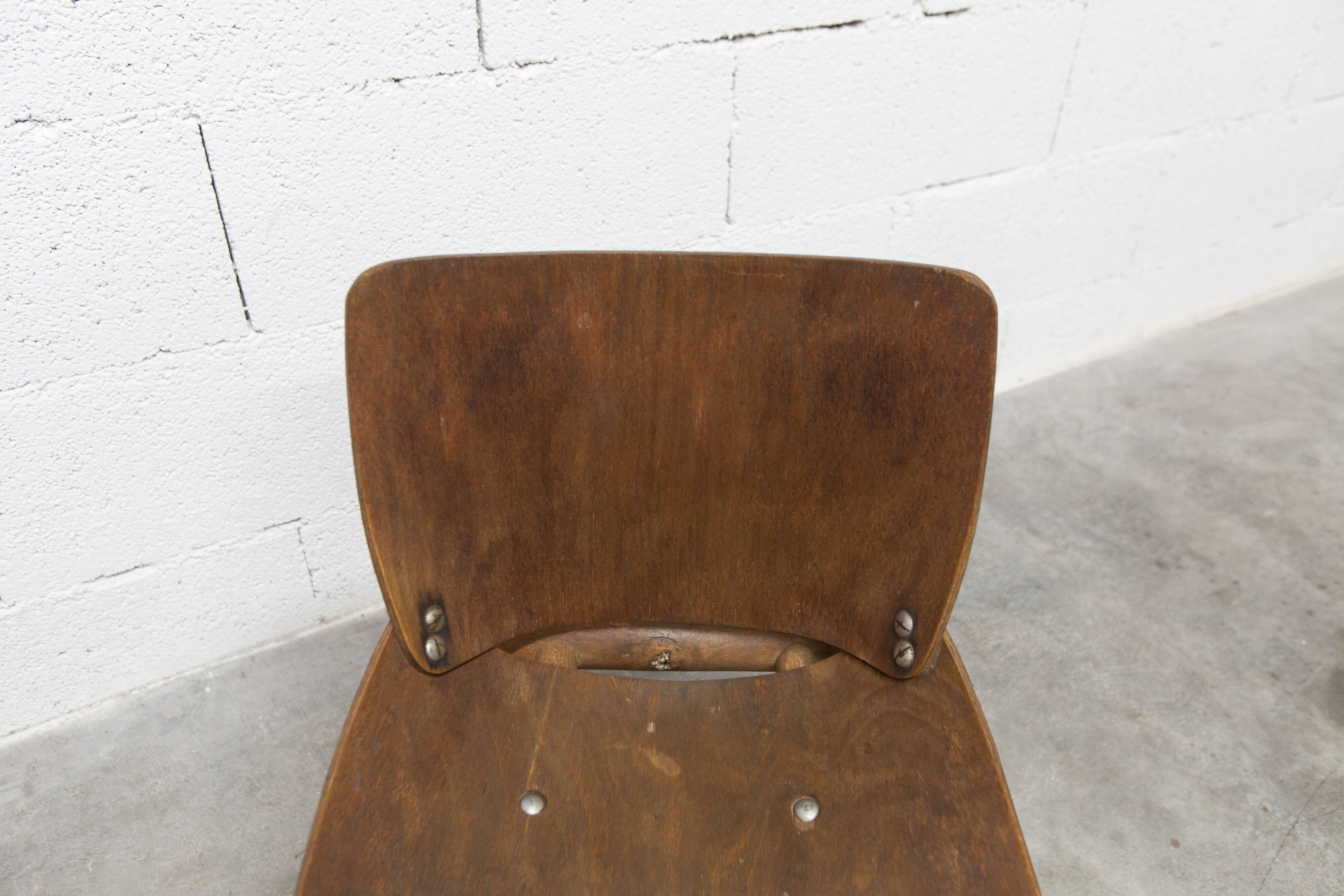 Atypical 1960s curved wood children's chair