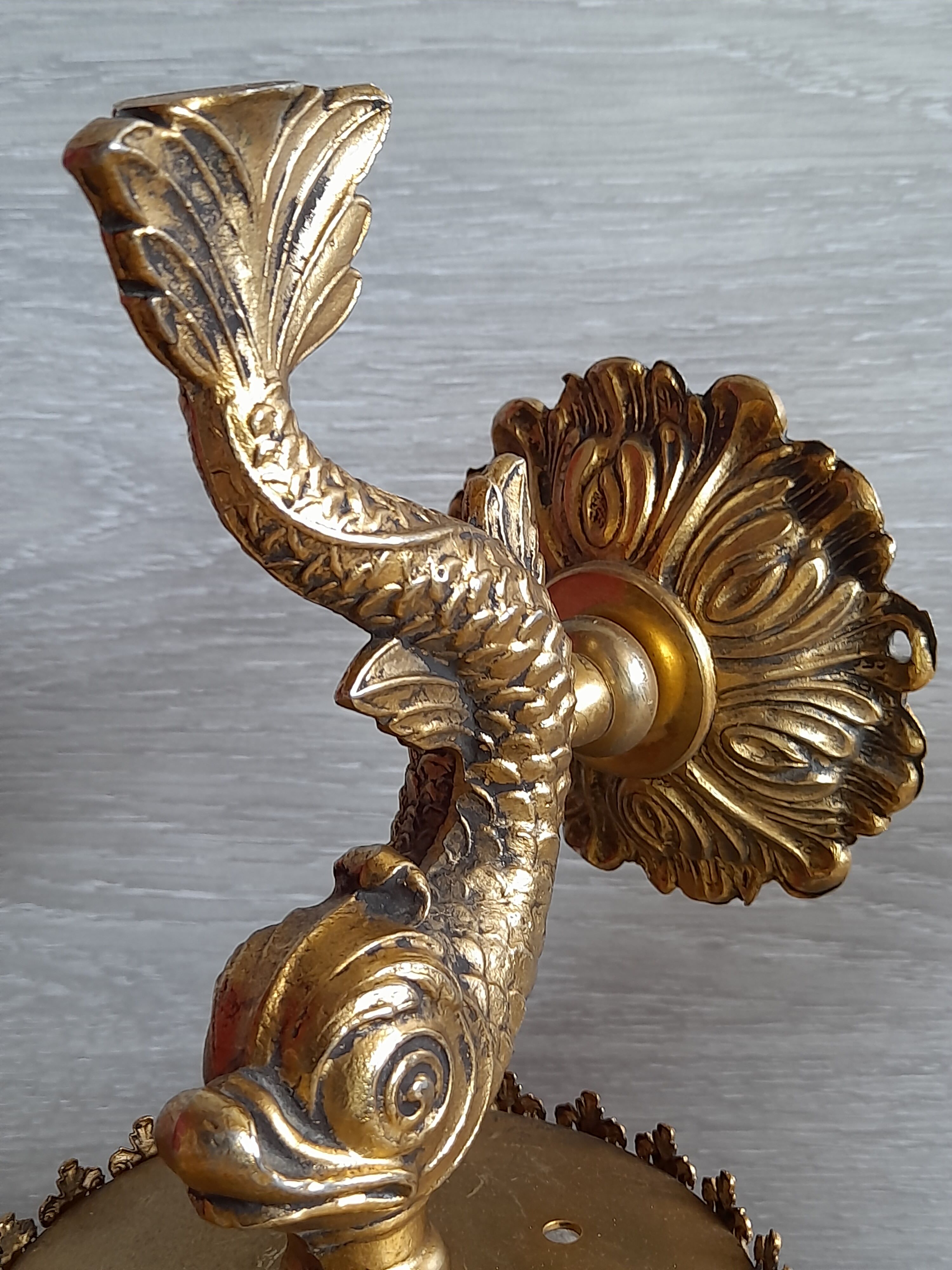 Pair of dolphin brass sconces