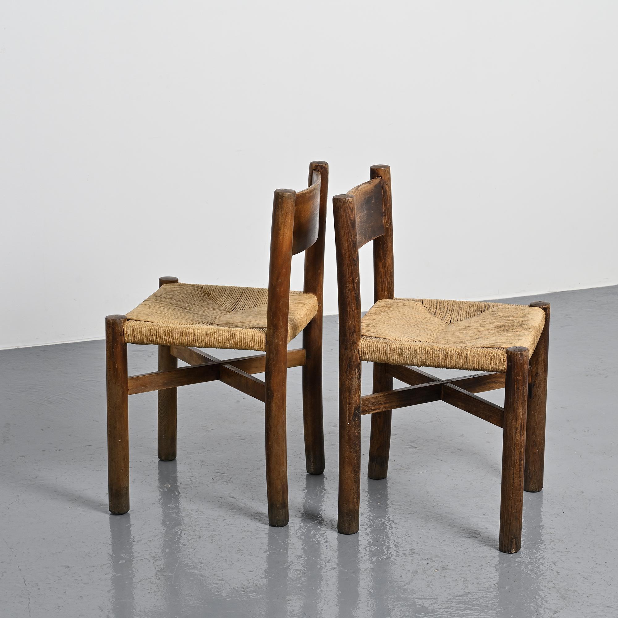 Pair of Méribel chairs by Charlotte Perriand, vintage edition BCB, circa 1950.
