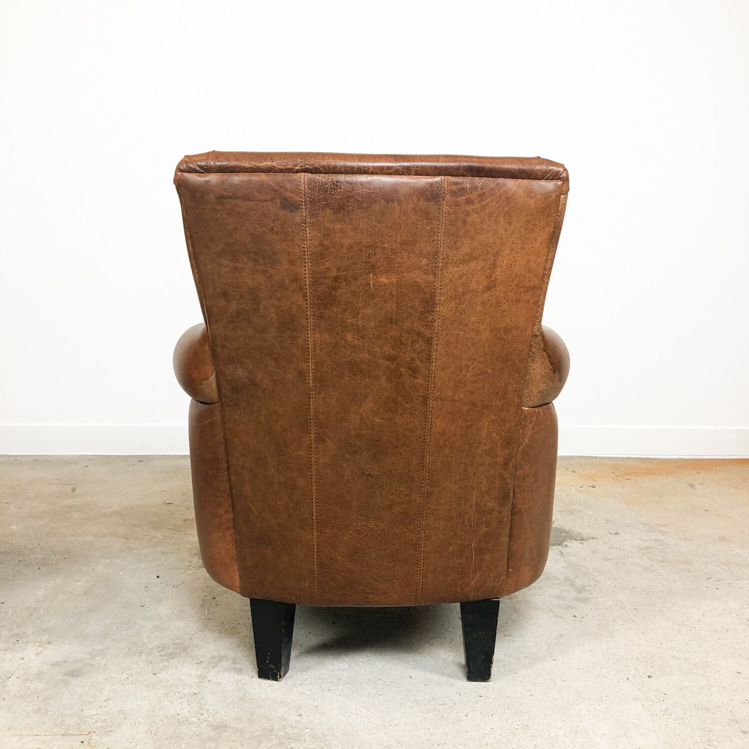 Set of two vintage leather armchairs