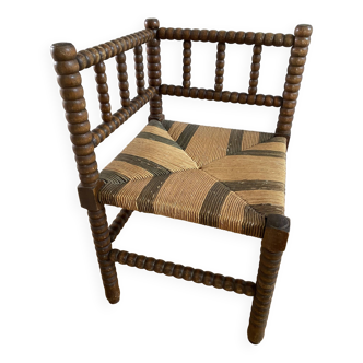 Chaise d'angle / fauteuil coin du feu en bois tourné perlé