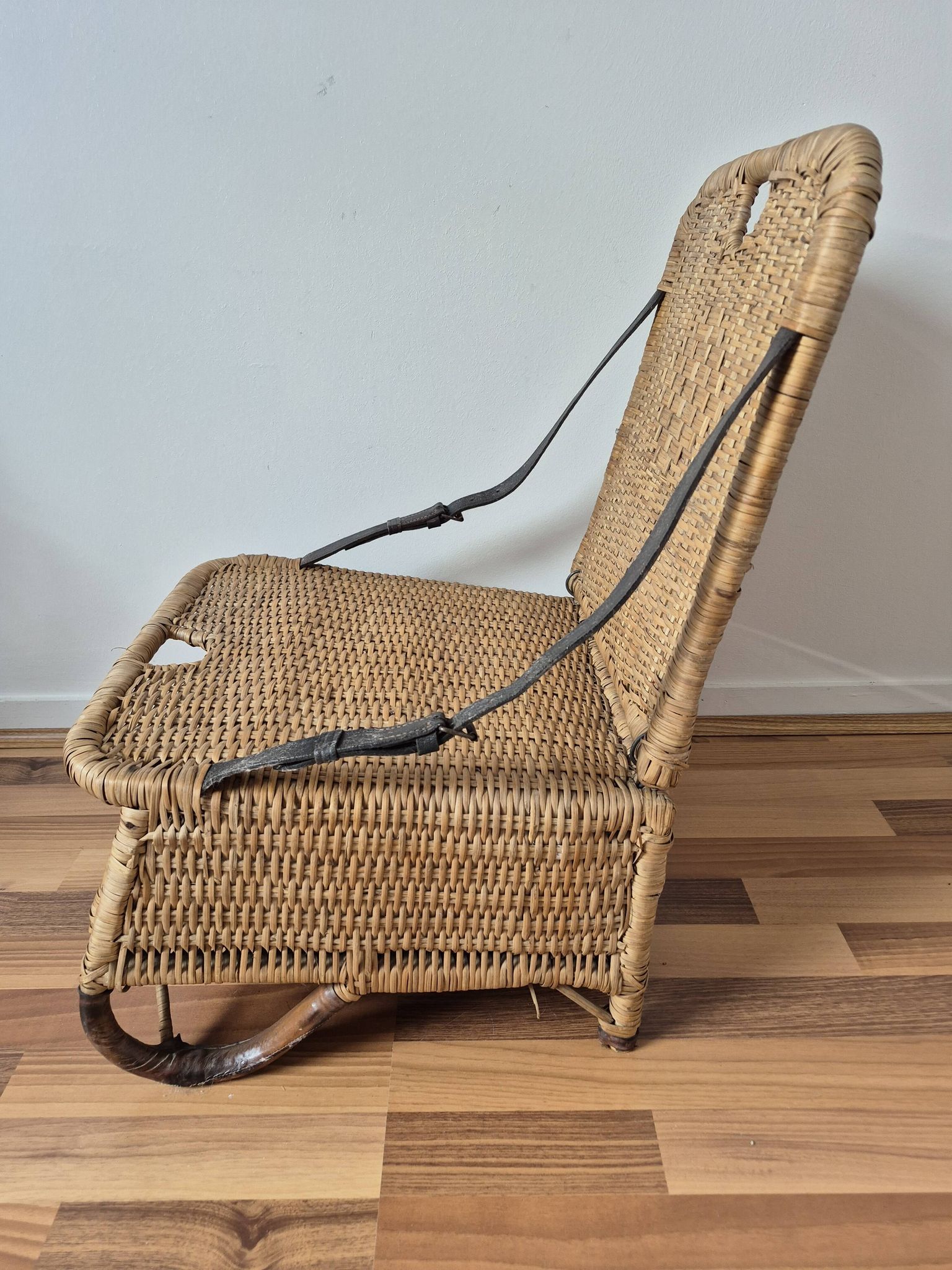 Vintage foldable beach chair, picnic in rattan and leather.