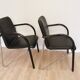 Set of 2 vintage office chairs in black leather chrome base plastic armrests / retro 1980s room