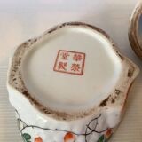 Large bird pocket emptier with butterflies and flowers.