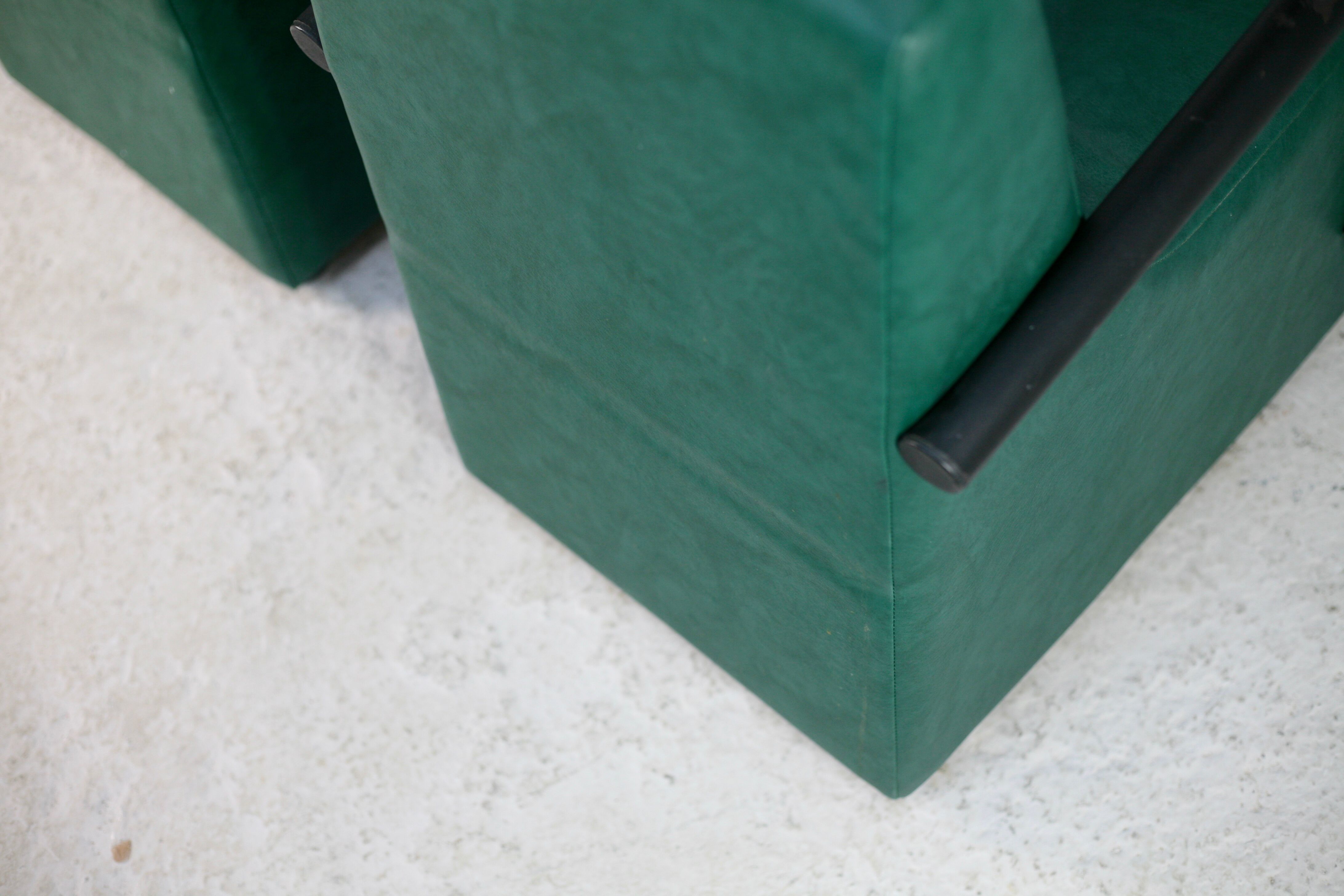 Pair of armrest heaters. Steel and green imitation leather. France, circa 1980