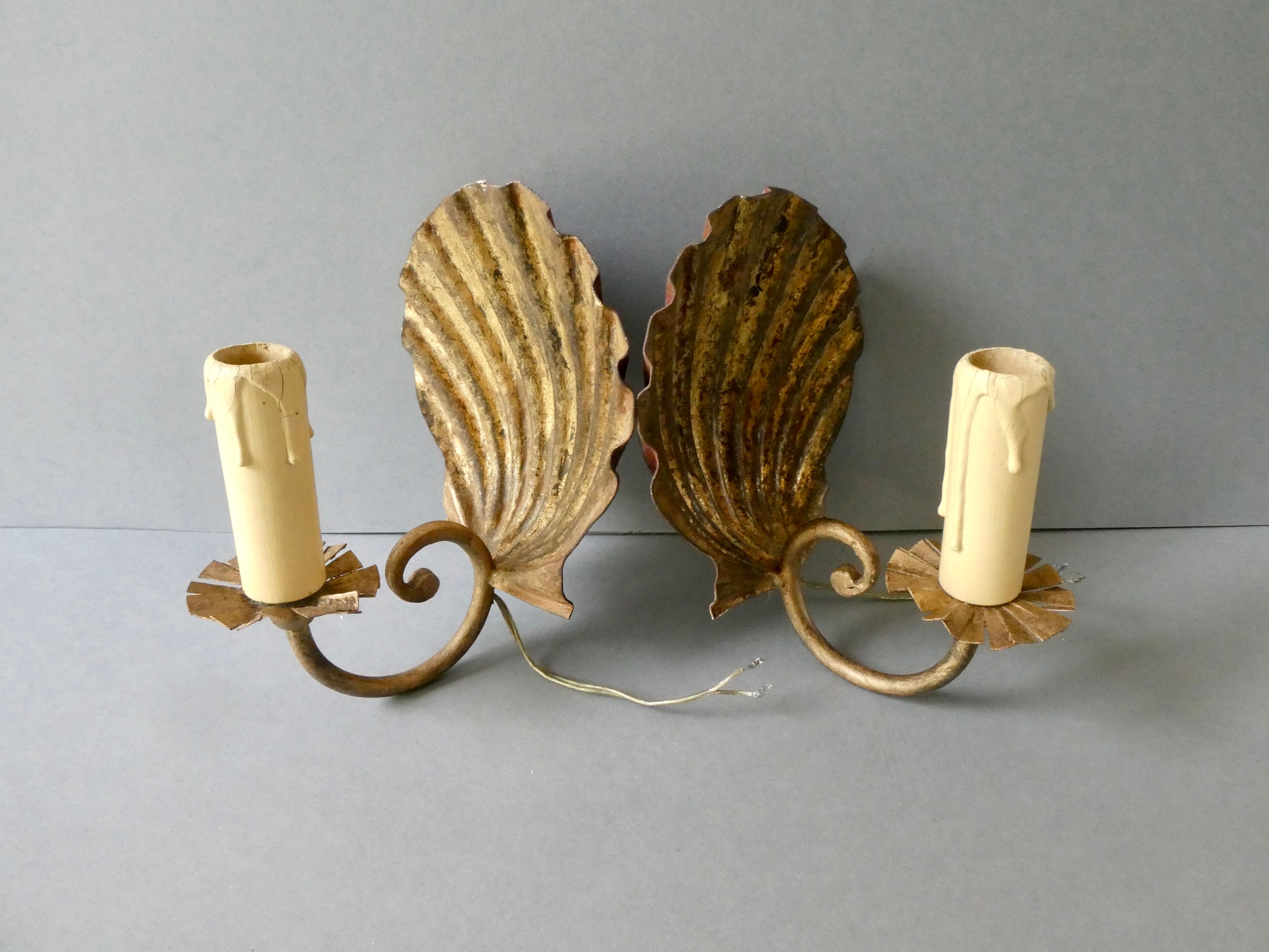 Pair of golden metal shell sconces