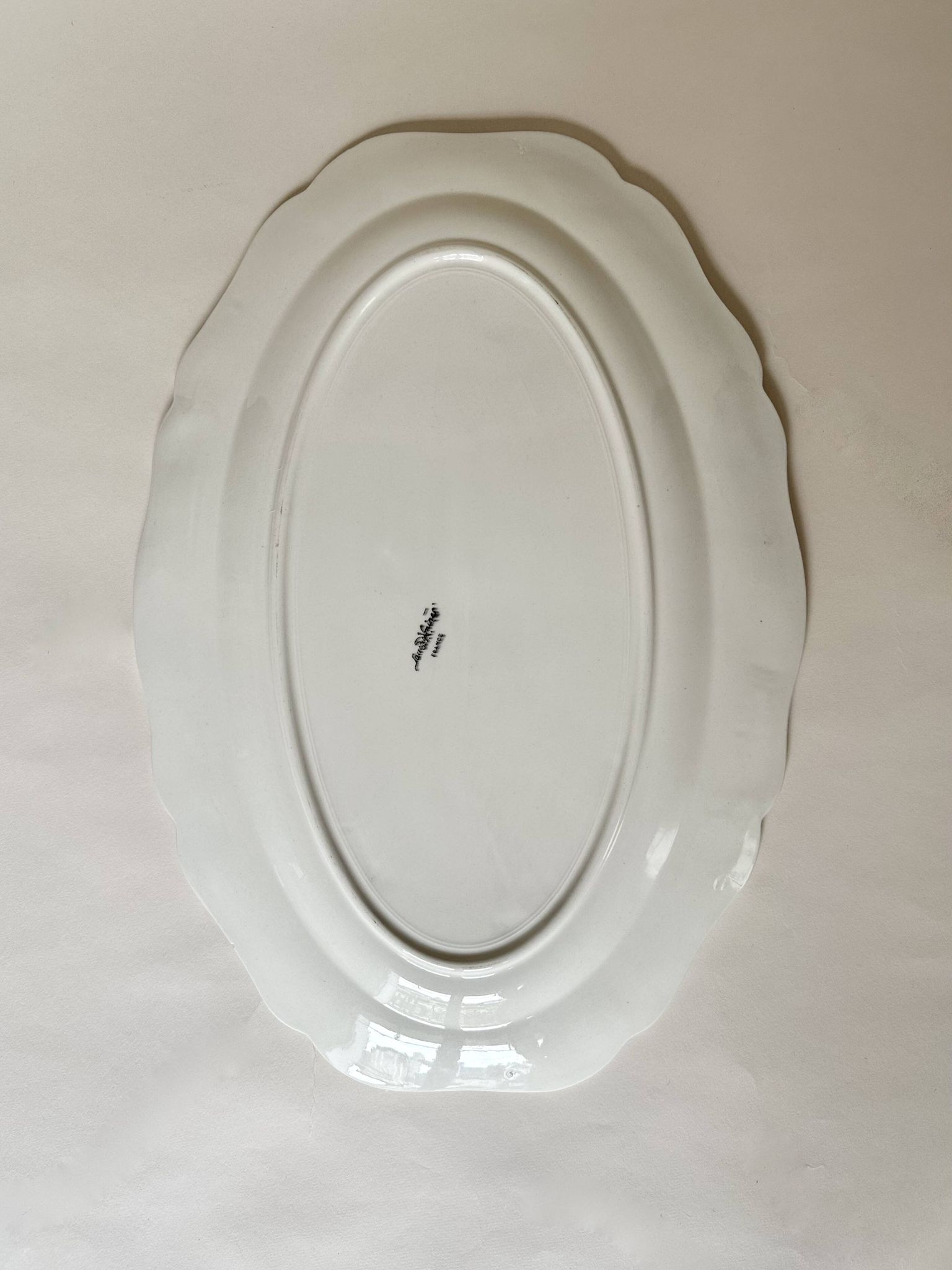 Shaped plates and dishes in Sarreguemines earthenware.