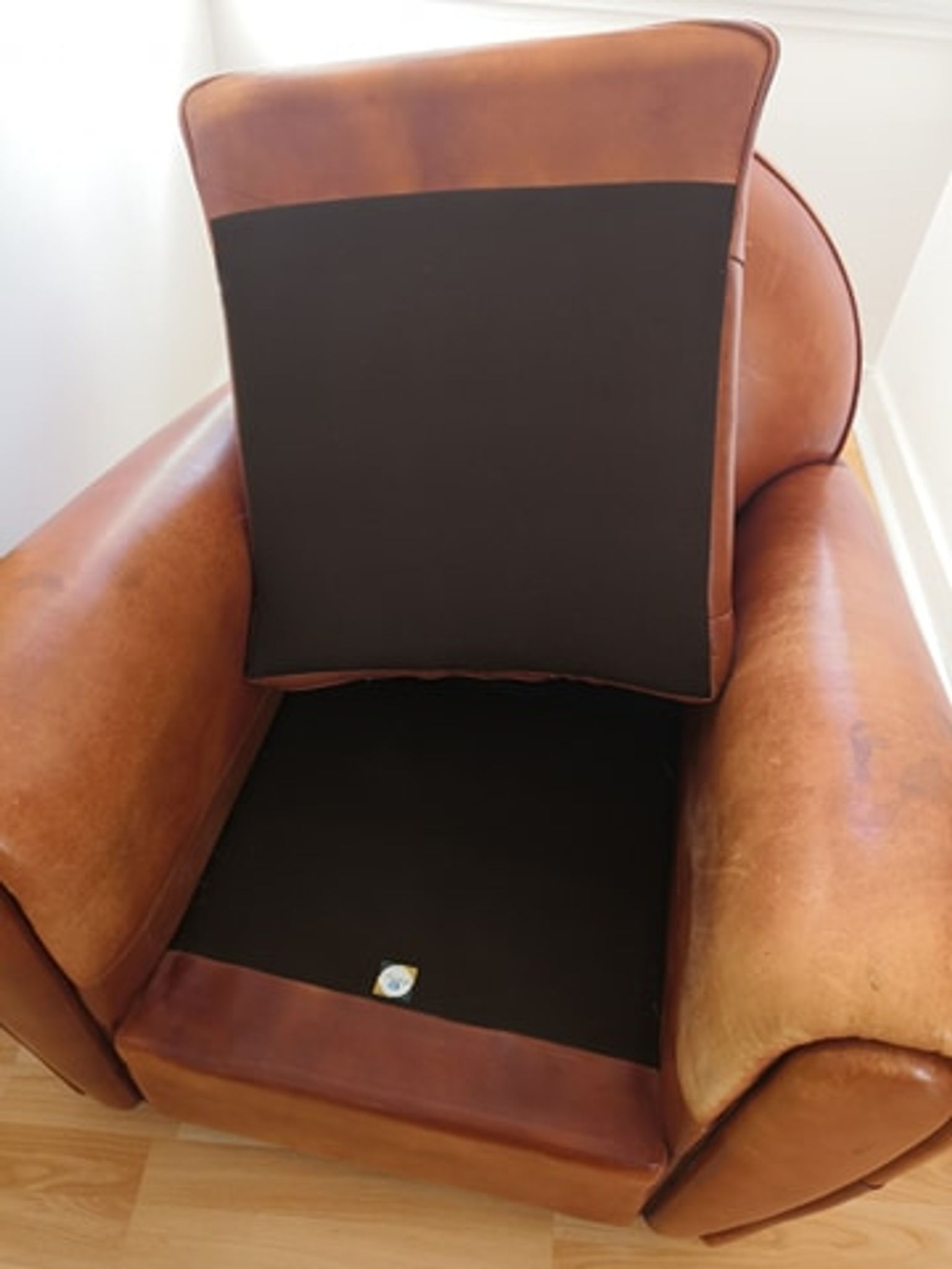Tawny vintage leather club chair