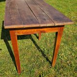 Wooden table with a drawer
